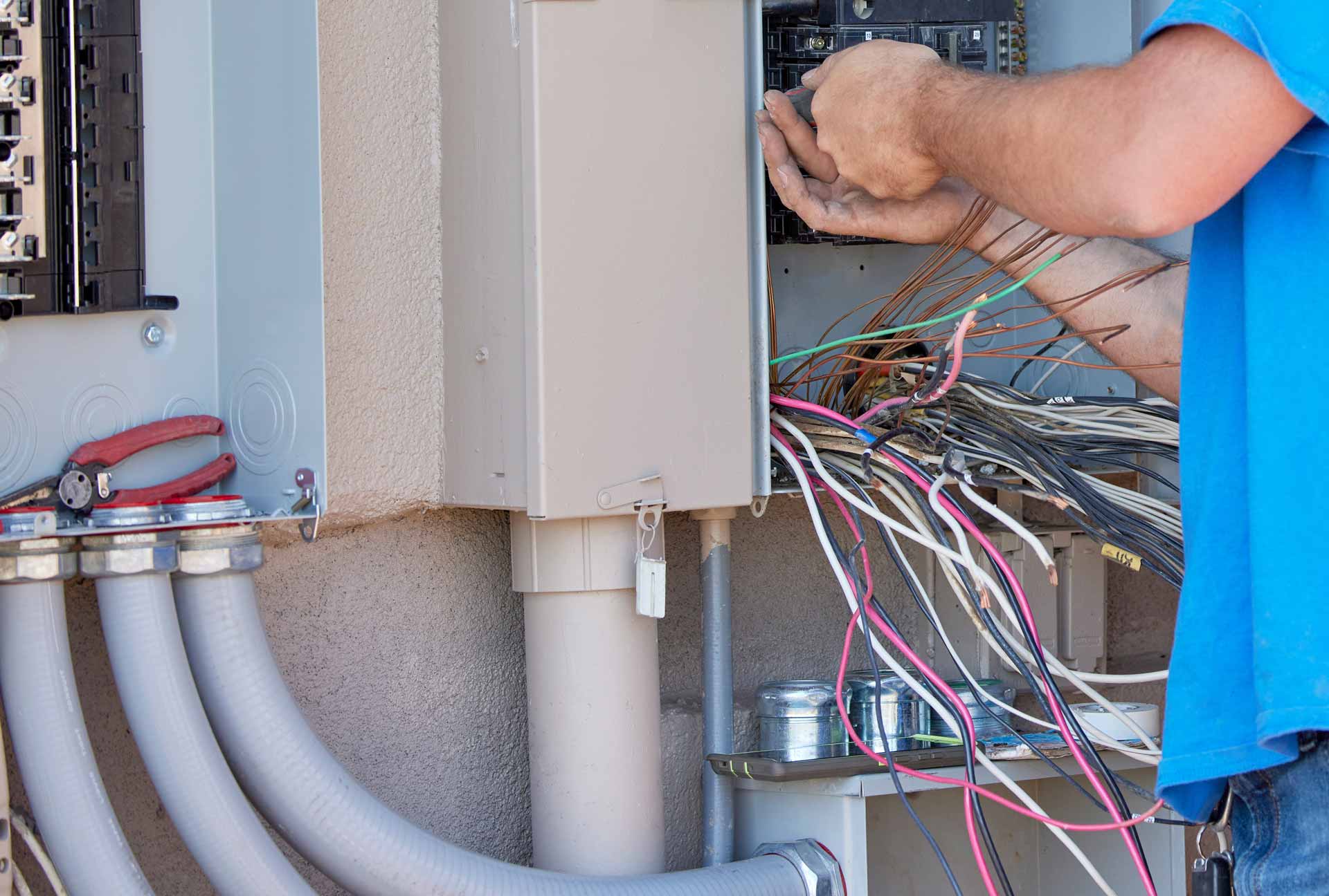 Electrician installing a new generator